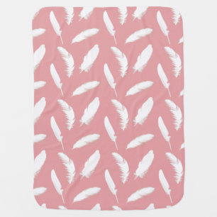 White feather print on shell pink baby blanket