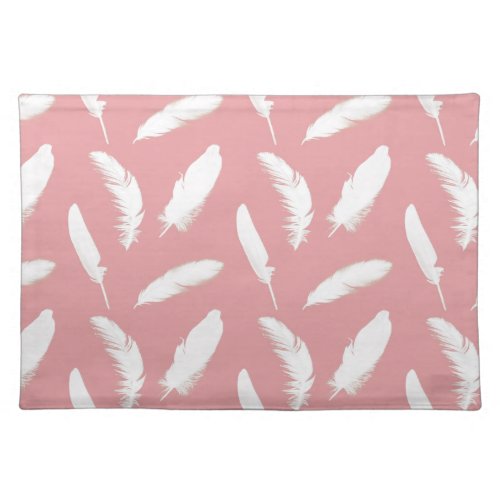 White feather print on shell pink cloth placemat