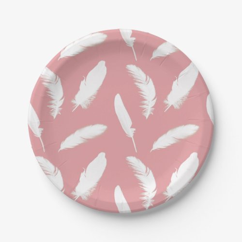 White feather print on shell pink paper plates