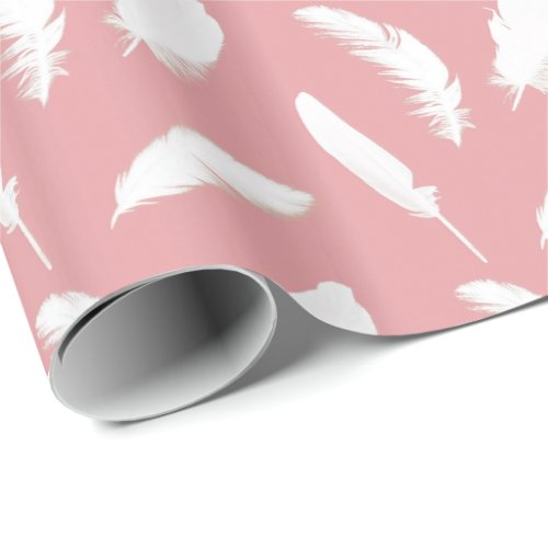 White feather print on shell pink wrapping paper