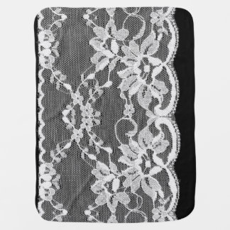 White floral lace: black background. baby blanket