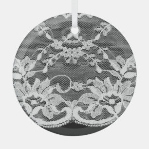 White floral lace: black background. glass ornament