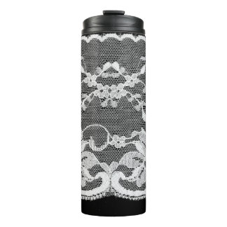 White floral lace: black background. thermal tumbler