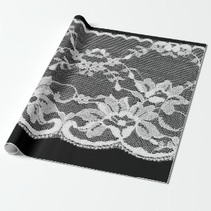 White floral lace on a black background. wrapping paper