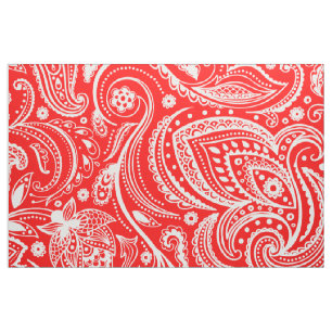 White floral paisley pattern on red fabric