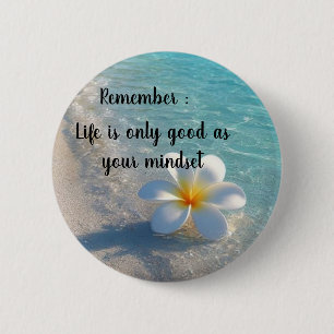 White flower brooch featuring a beach theme  button