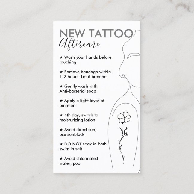 White Flower on Girl Shoulder New Tattoo Aftercare Business Card