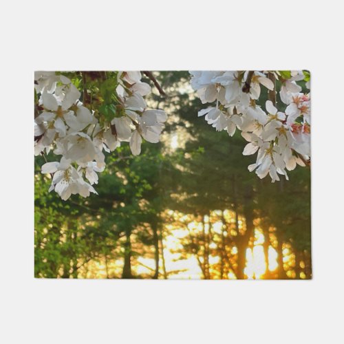  white flowering tree buds sunrise thru pine trees doormat