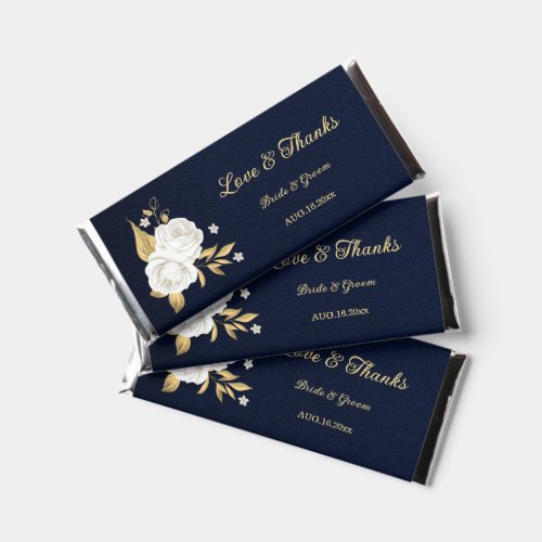 white flowers gold leaves navy blue wedding hershey bar favors