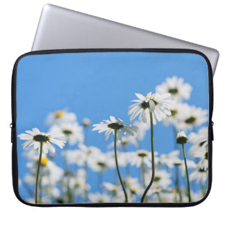 White flowers in clear day laptop sleeve