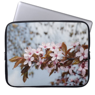 White flowers of cherry in spring garden laptop sleeve