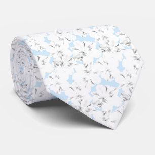 White flowers on light blue. neck tie