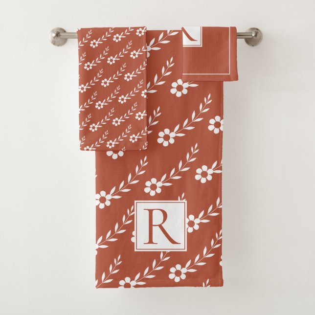 White flowers pattern and monogram terracotta bath towel set (Insitu)