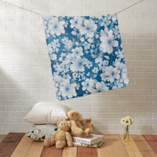 white flowers pattern, blue background, baby blanket