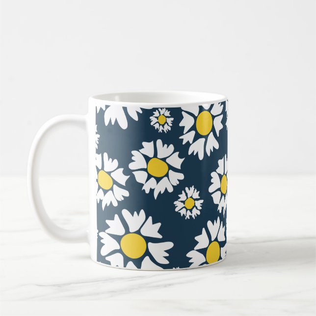 White flowers, yellow center, on blue background coffee mug (Left)