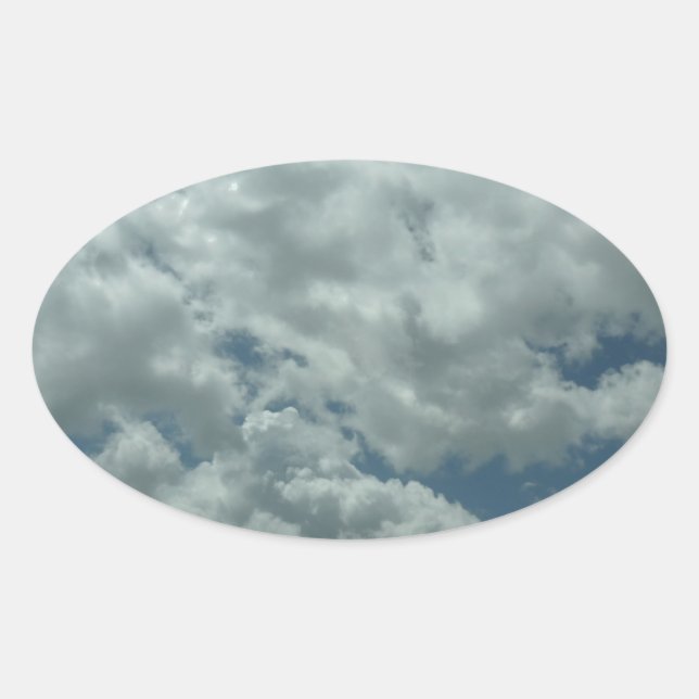 White, fluffy clouds in blue sky oval sticker (Front)