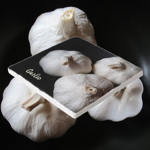 White Garlic Cloves Black Trivet