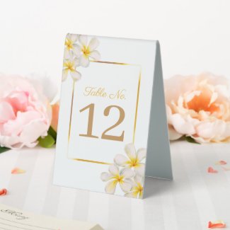White golden frangipani tropical wedding number table tent sign