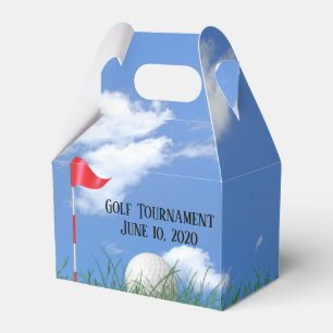 white golf ball and flag in grass favor boxes