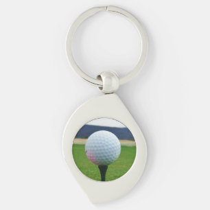 white Golf Ball on a mountain golf course Keychain