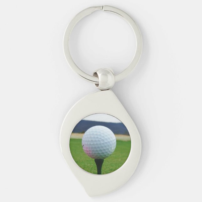 white Golf Ball on a mountain golf course Keychain (Front)