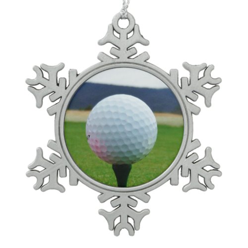 white Golf Ball on a mountain golf course Snowflake Pewter Christmas Ornament