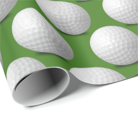 white golf balls on green wrapping paper