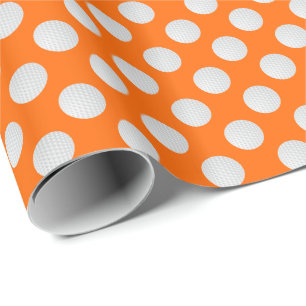 White Golf Balls on Orange Wrapping Paper