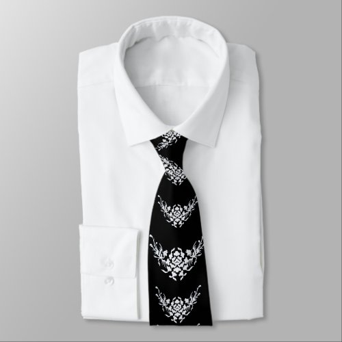 WHITE GRIFFINS AND FLOWERS IN BLACK NECK TIE