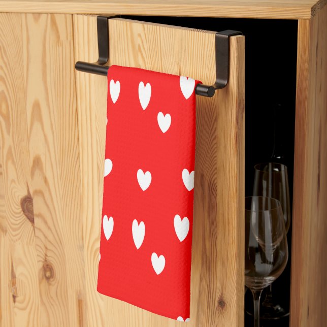 White hearts pattern on red kitchen towel (Thirds Fold)