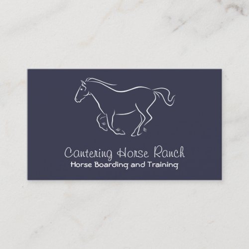 White horse cantering on blue business card