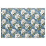 White hydrangea blossoms on blue  fabric