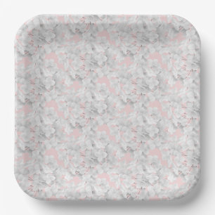 White Hydrangea Flower Petals On Pink Paper Plates