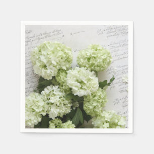 White hydrangeas with script writing paper napkins
