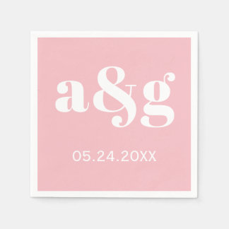 White initials typography on pink wedding napkins