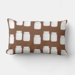 White jars on brown lumbar pillow