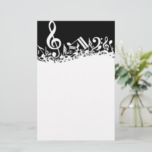 White Jumbled Musical Notes on Black Stationery