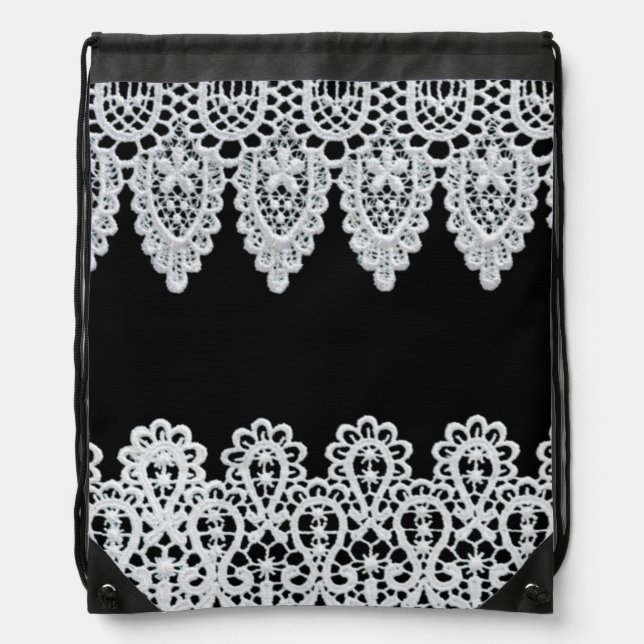 White lace forms a delicate border against black drawstring bag (Front)