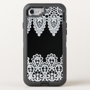 White lace forms a delicate border against black OtterBox defender iPhone SE/8/7 case