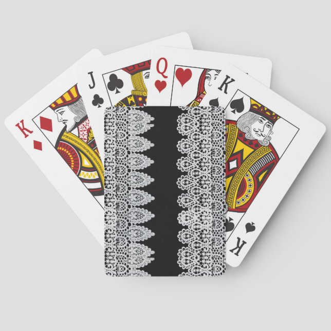 White lace forms a delicate border against black poker cards (Back)
