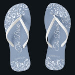 White Lace on Dusty Blue Elegant Bride's Wedding Flip Flops<br><div class="desc">Dance the night away with these beautiful wedding flip flops. Designed for the bride, they feature a simple yet elegant design with fancy script lettering on a dusty blue background and white lace curls and swirls. Beautiful way to stay fancy and appropriate while giving your feet a break after a...</div>