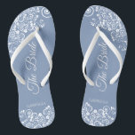 White Lace on Dusty Blue Elegant Bride's Wedding Flip Flops<br><div class="desc">Dance the night away with these beautiful wedding flip flops. Designed for the bride, they feature a simple yet elegant design with fancy script lettering on a dusty blue background and white lace curls and swirls. Beautiful way to stay fancy and appropriate while giving your feet a break after a...</div>
