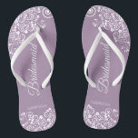 White Lace on Dusty Purple Bridesmaid Wedding Flip Flops<br><div class="desc">These beautiful wedding flip flops are a great way to thank and recognize your bridesmaids while saving their feet at the same time. Features an elegant design with white floral lace filigree on a dusty purple, lilac, or lavender colored background. The elegant script lettering reads Bridesmaid with her name below....</div>