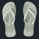 White Lace on Sage Green Bridesmaid Wedding Flip Flops<br><div class="desc">These beautiful wedding flip flops are a great way to thank and recognize your bridesmaids while saving their feet at the same time. Features an elegant design with white floral lace filigree on a dusty purple, lilac, or lavender colored background. The elegant script lettering reads Bridesmaid with her name below....</div>