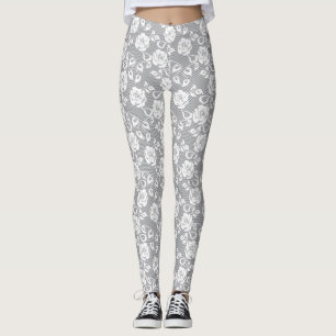 White lace pattern on gray background leggings