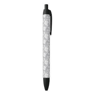 White lace pattern on gray background pen