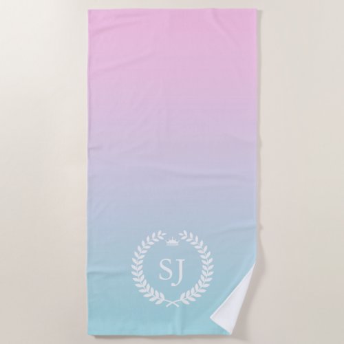 White laurel wreath on soft pink to blue ombre beach towel