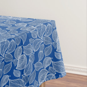 White Leaves on Blue Tablecloth
