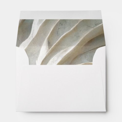 White marble and wings envelope