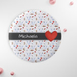 White Medical Equipment Pattern and Red Heart Button<br><div class="desc">Cute personalize button with a background of a medical equipment. From adhesive bandages, pills, bottles to blue stethoscopes. In the middle front there is a wide gray line with the white text that you can personalize. On the right side of the text, there is an illustrated red heart. Customize further...</div>